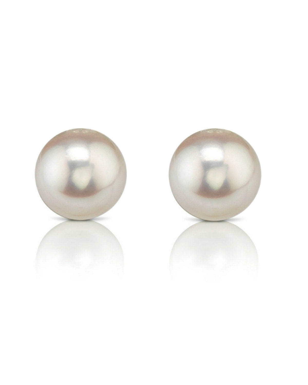 White pearl stud earrings with sterling silver backs, showcasing elegant, lustrous pearls