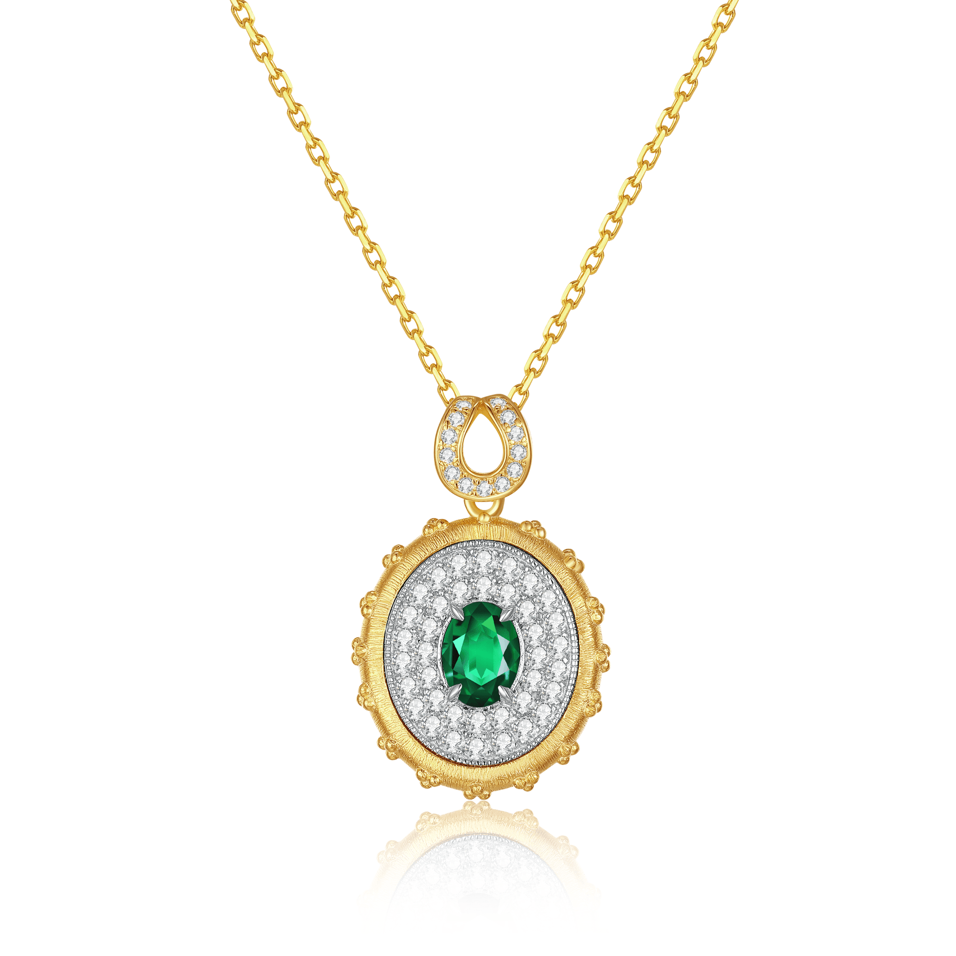 Elevate your style with a gold oval pendant adorned with pave setting, showcasing a simulated emerald gemstone at the center.