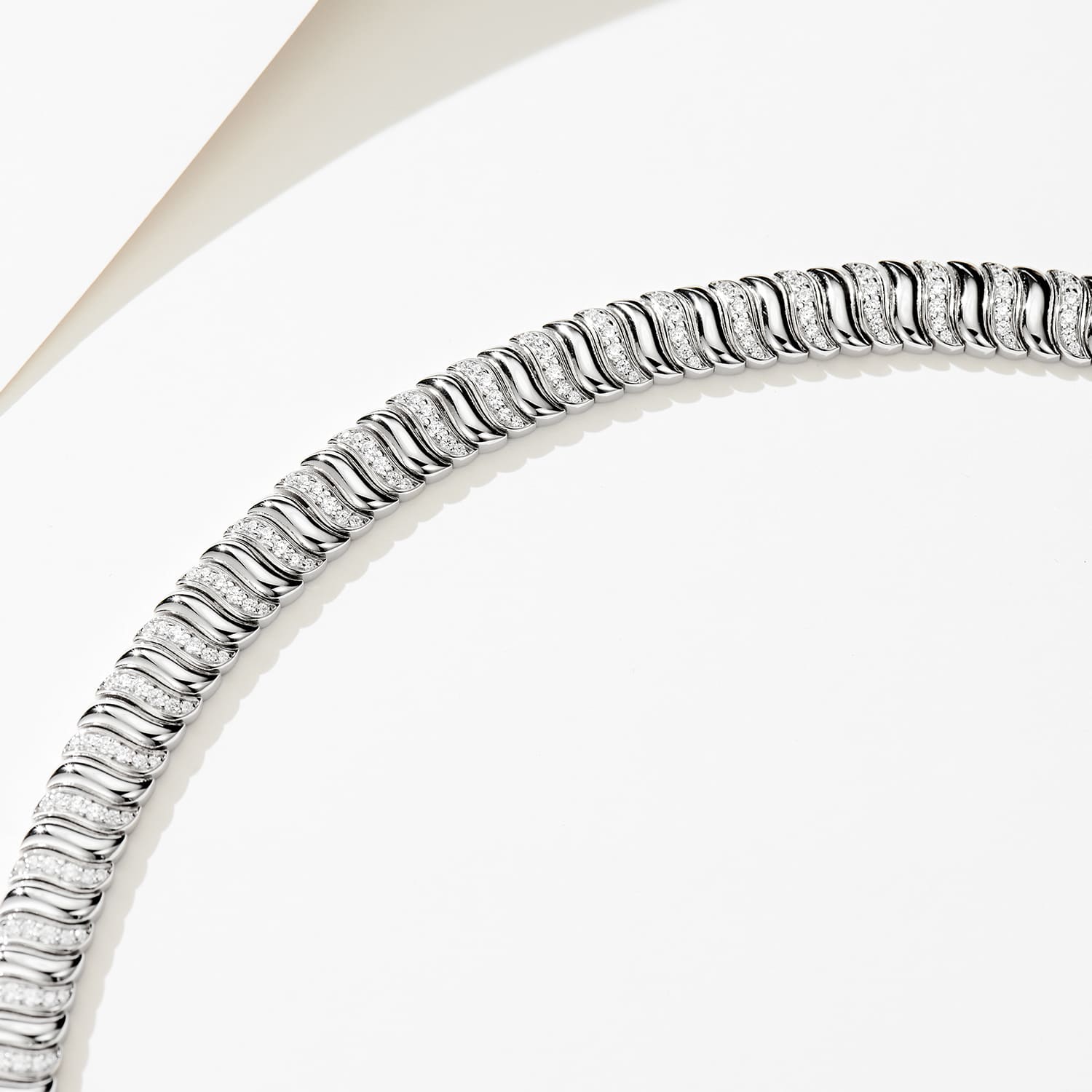 Perfect blend of firmness and flexibility in our impressive Half Pave Twisted Silver Bracelet, weighing 27g.