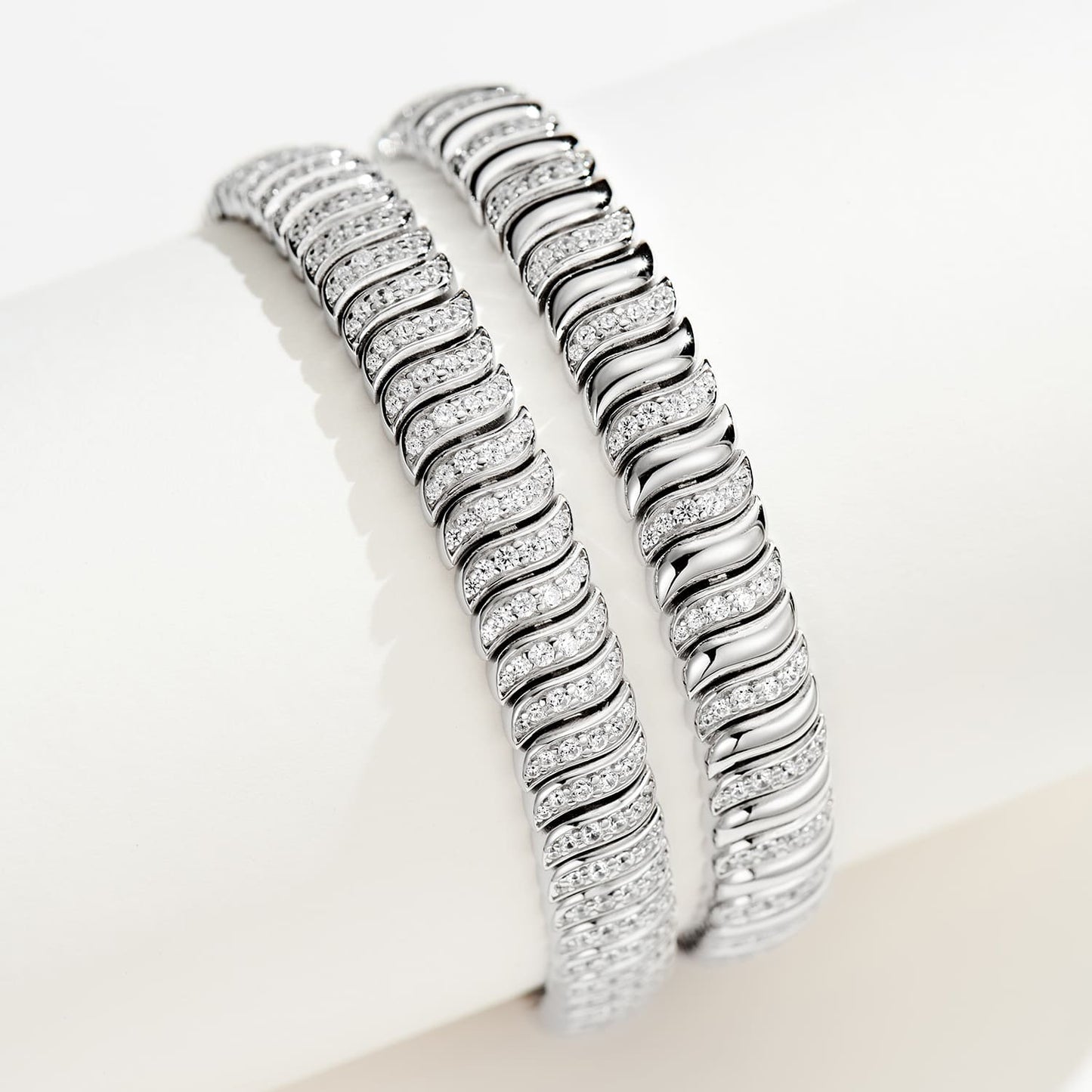 Enhance your style with the Half Pave Twisted Silver Bracelet, a perfect companion to other pieces in the exquisite collection for a cohesive and sophisticated ensemble.