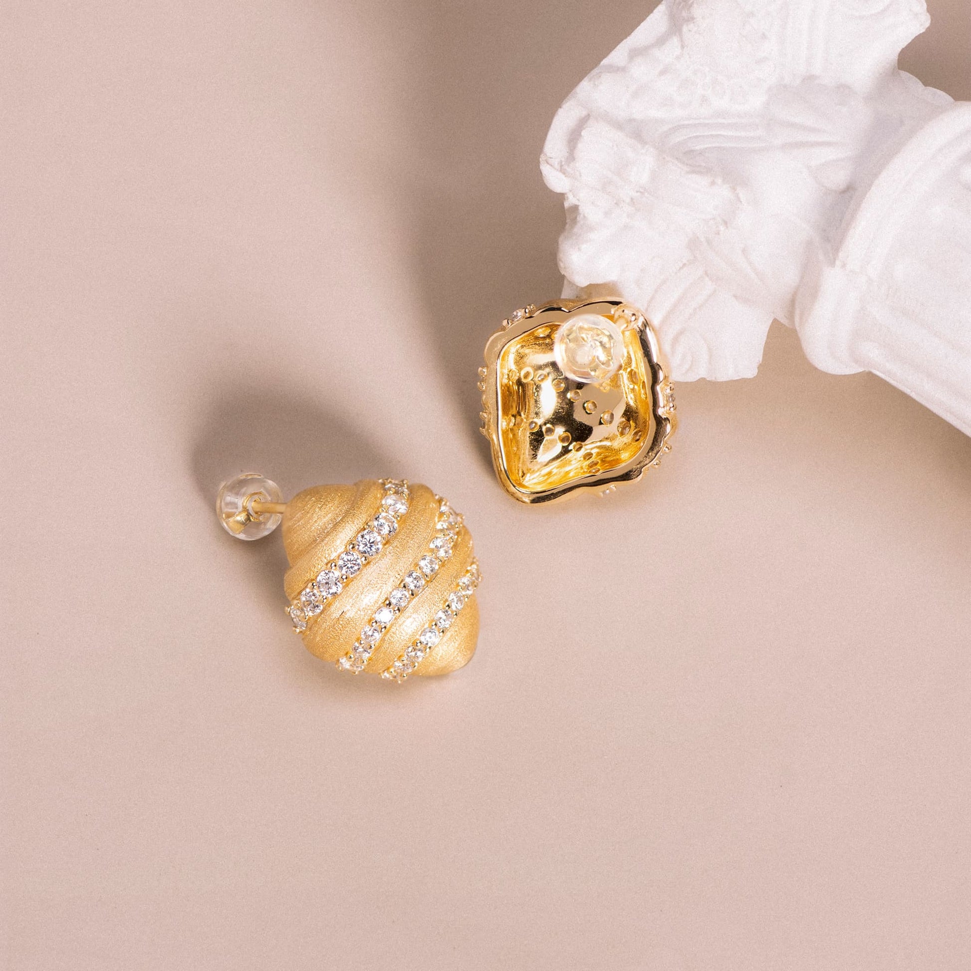 Elegant Gold Earrings with Faux Diamonds, Showcasing Velvet-like Texture