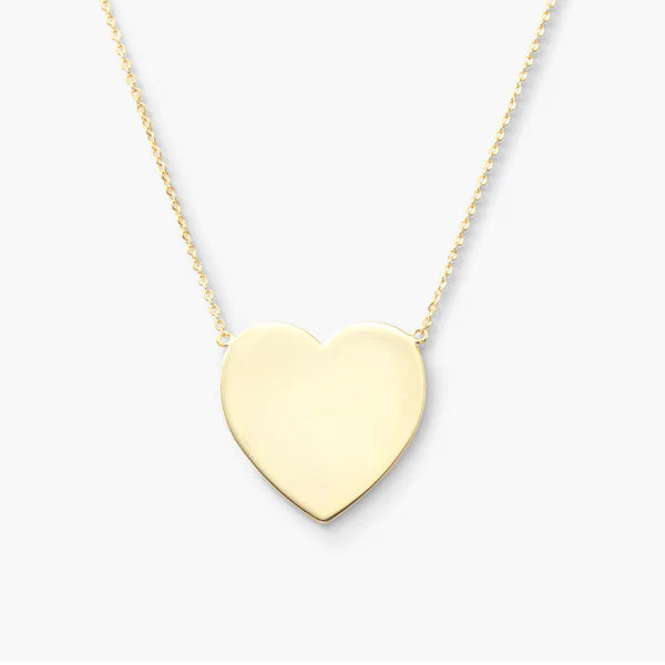 Versatile love: EverHeart Necklace with double-sided charm, perfect for layering or standalone wear.