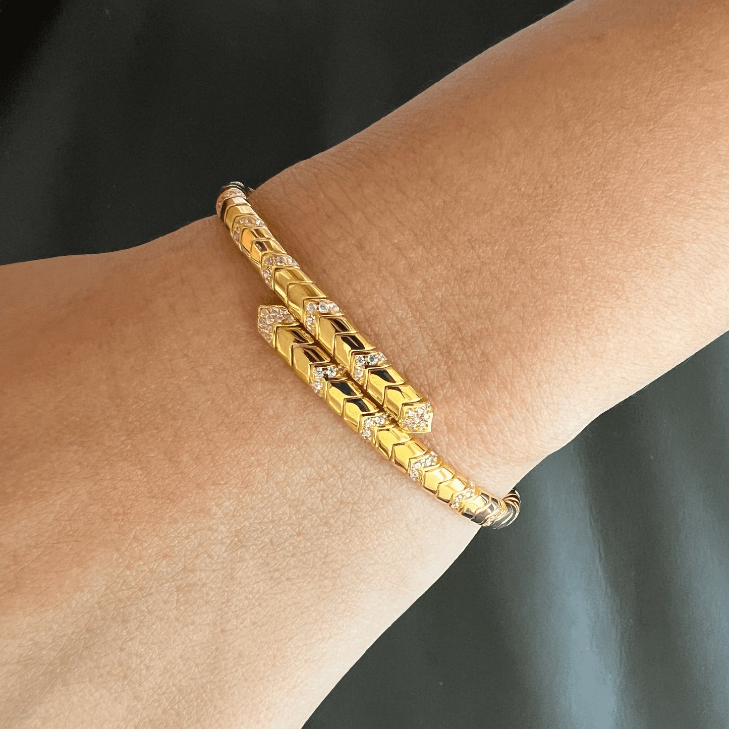 Versatile design: Serpent Bracelet effortlessly transitions from casual to opulent glamour.