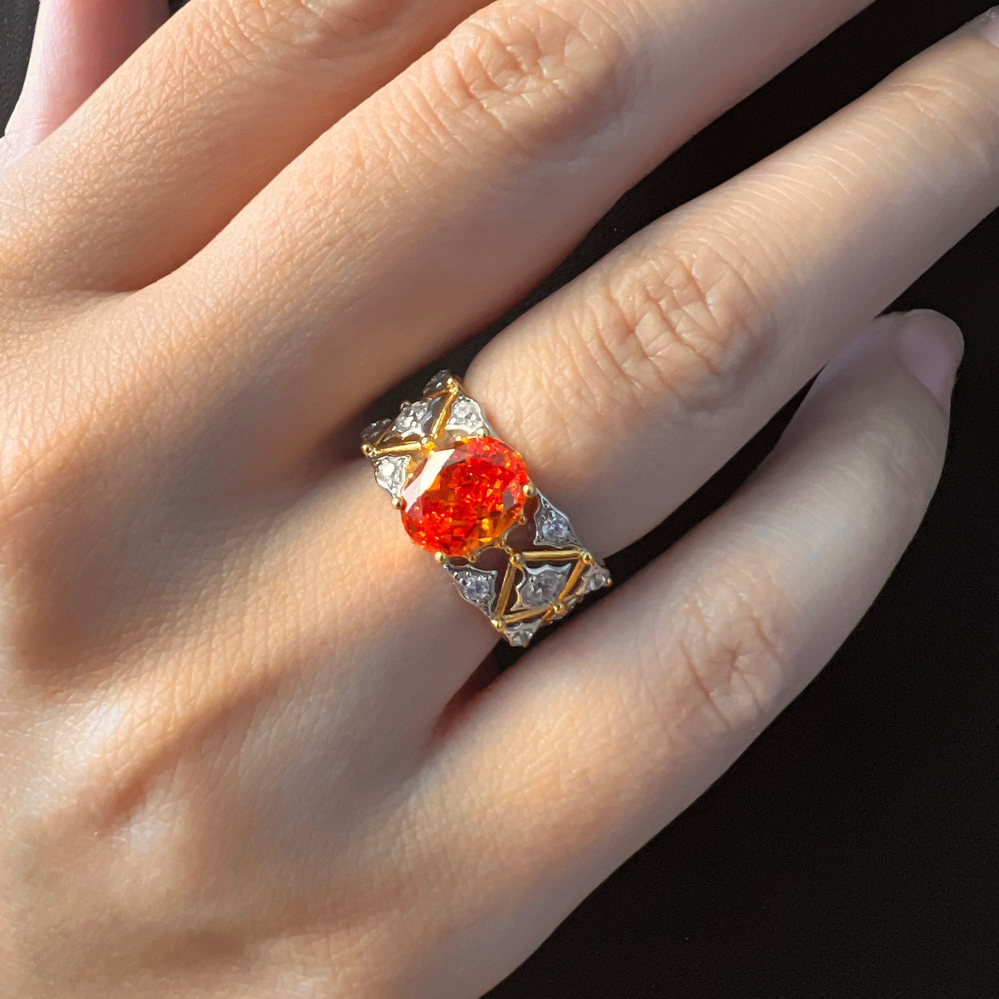 Captivating on the model: Radiant Ember Simulated Garnet Statement Ring, a bold expression of timeless elegance and style.