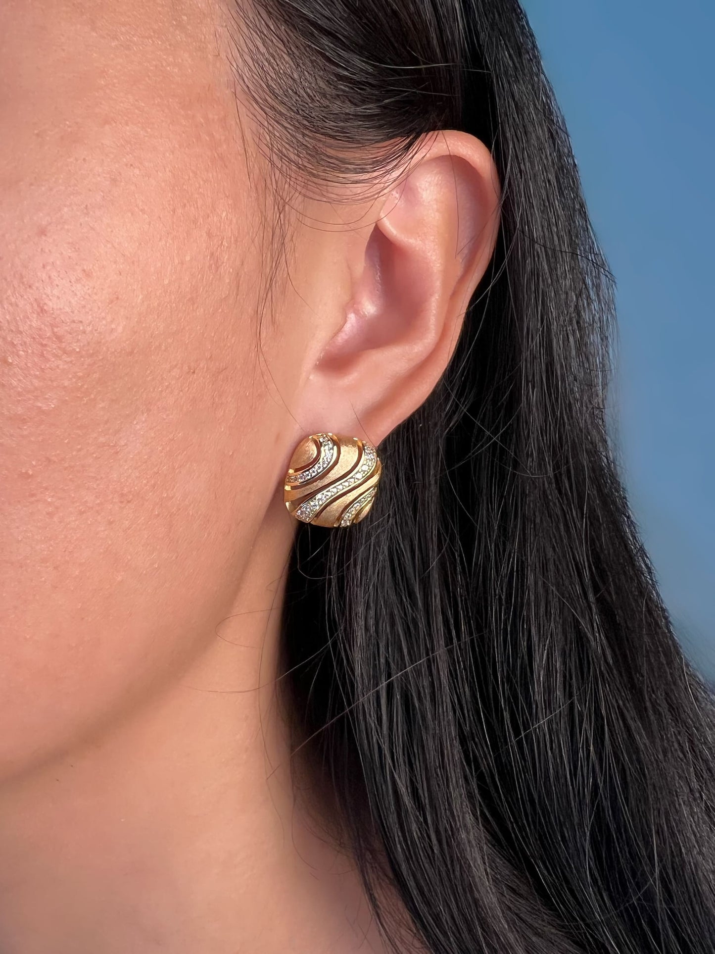 Model showcasing the elegance of Golden Square Earrings with Simulated Diamonds