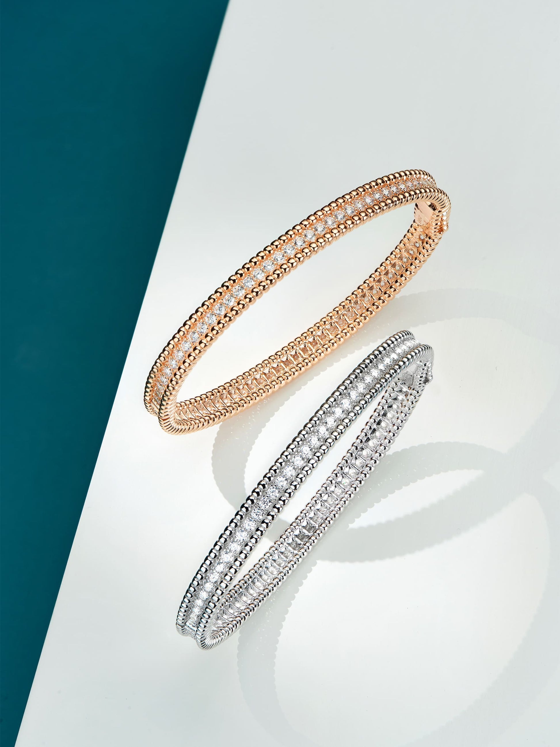 Orbit Bracelets in rose gold and silver, a perfect combination of timeless allure in one captivating image.