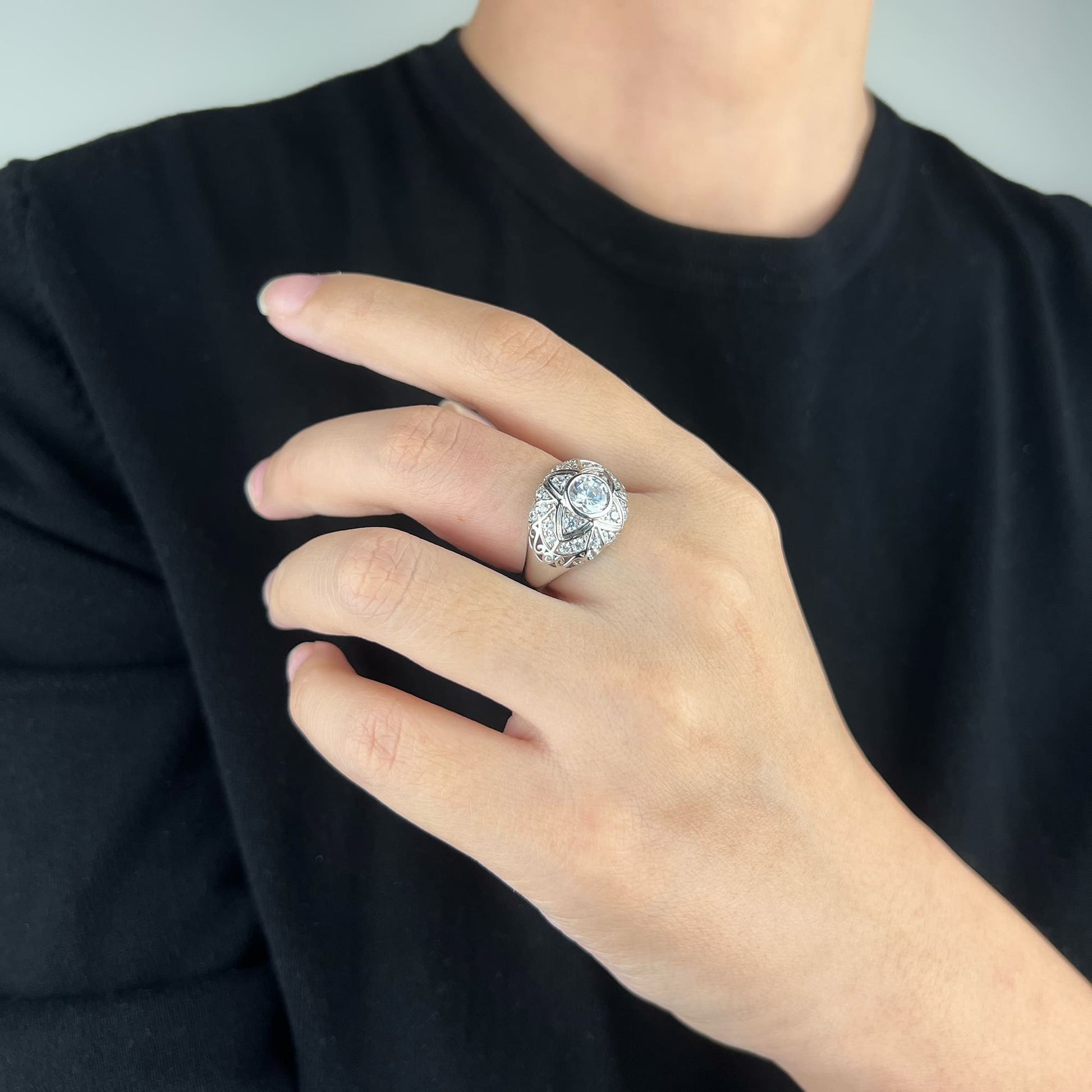 Close-up of Quatrefoil Ring showcasing graceful curves and intricate detailing