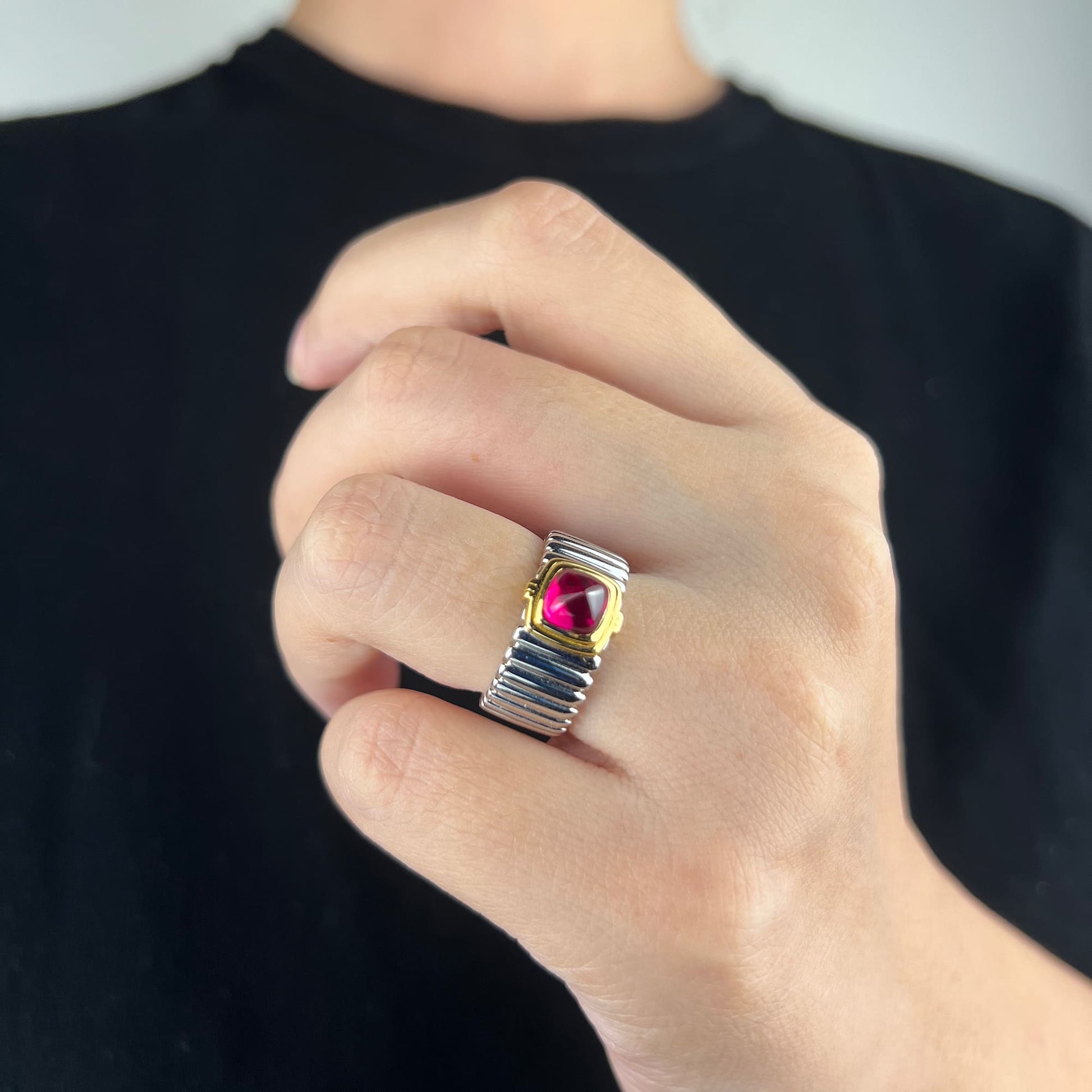 Close-up of vintage-inspired ring with a 4-carat sugarloaf cabochon