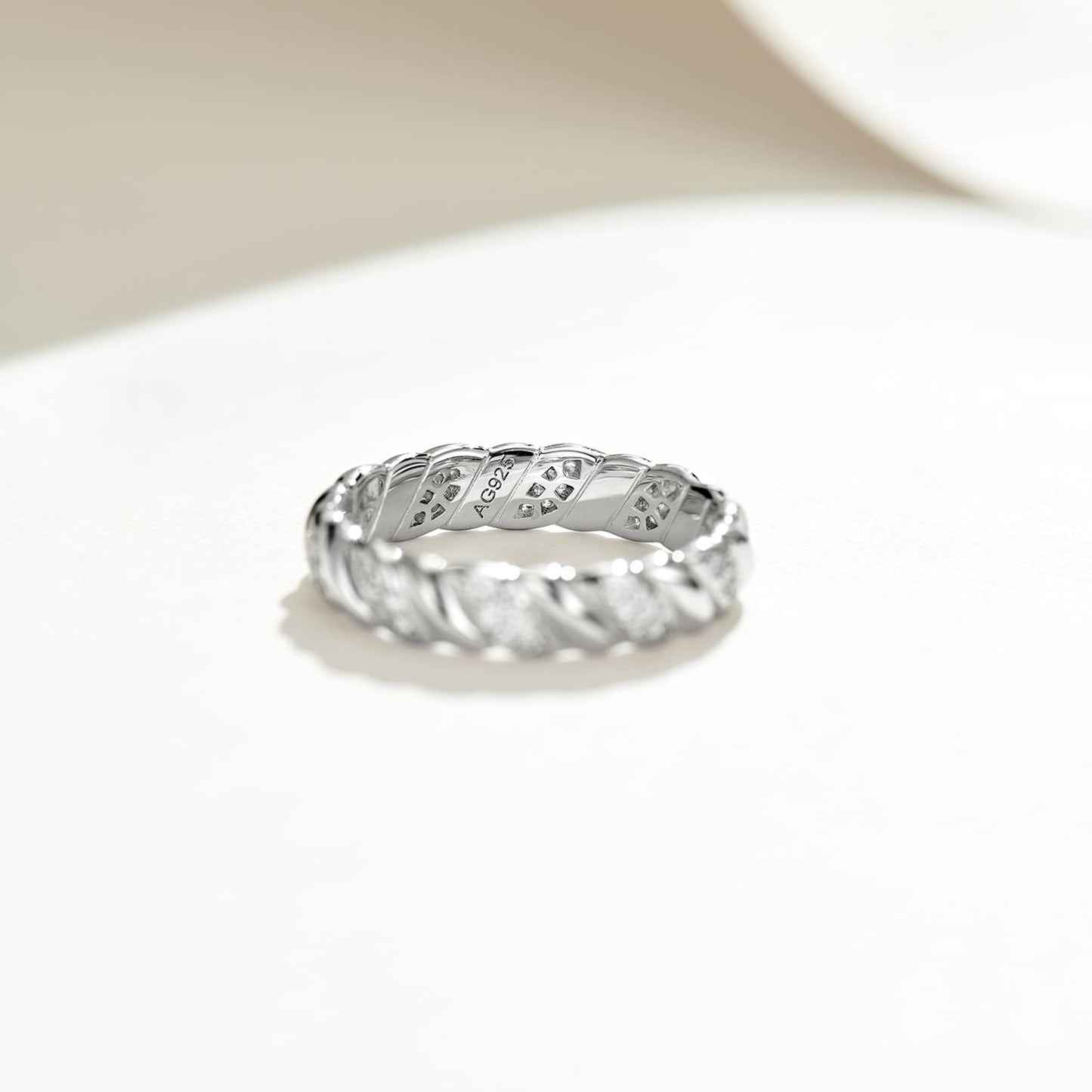 Close-up of the exquisite hallmark on our Half Pave Twisted Silver Ring.