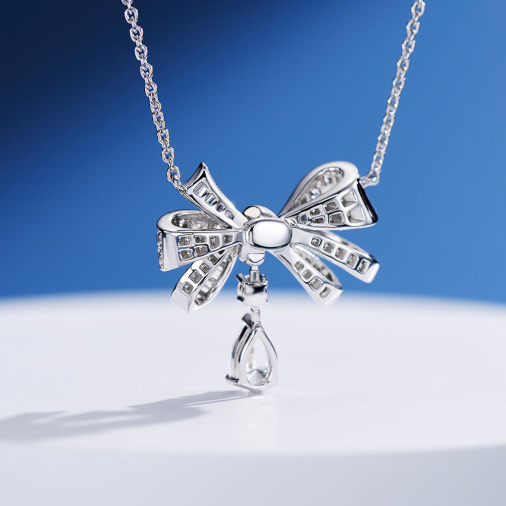 The Belle Bow Necklace in silver, showcasing the back design