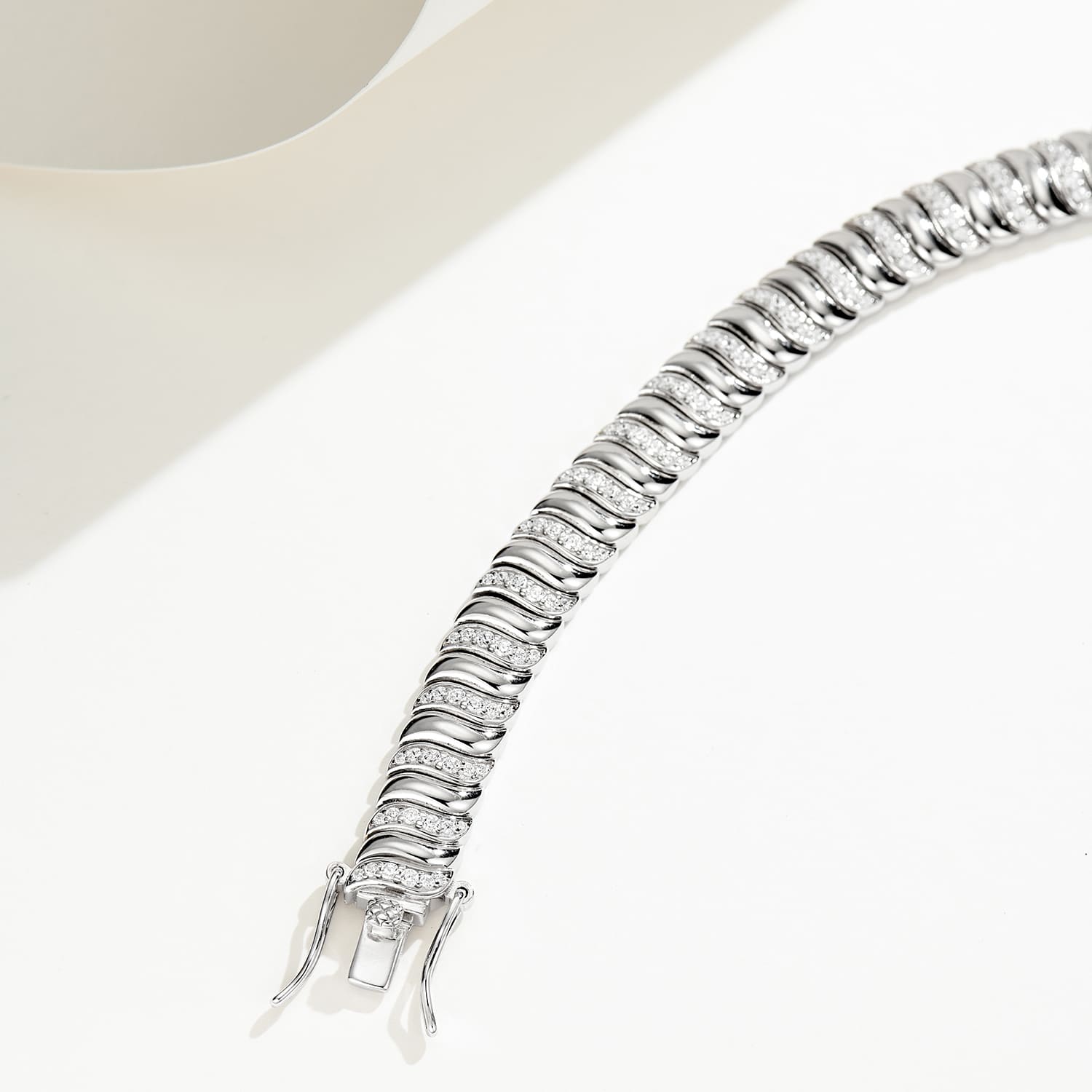 Seamless joints and premium feel: Try on the impressive Half Pave Twisted Silver Bracelet for a touch of refined elegance.