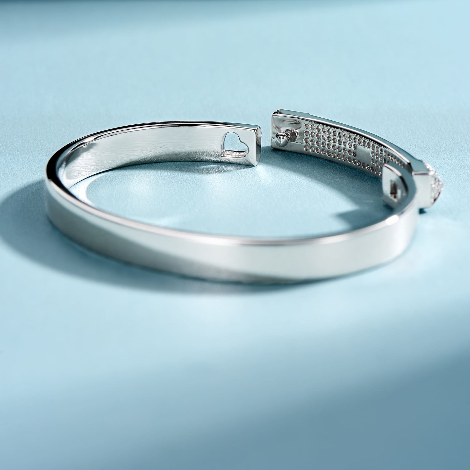 Capture the sparkle: Half Pave Bracelet in a stunning side view, showcasing its delicate design.